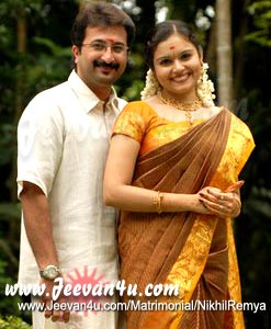 Nikhil Remya Ravindran Engagement Marriage Photos